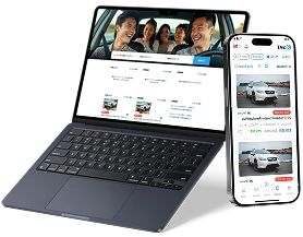 在庫車両を表示するノートパソコンとスマートフォン
